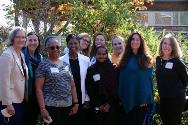 Group of people smiling for the camera